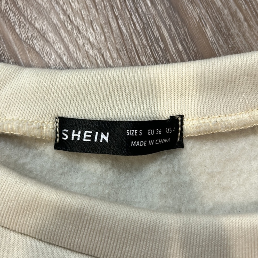Shein crew neck, kinda cropped. Very soft, never worn. - Picture 2 of 3